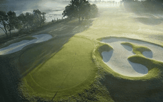 House for sale with a golf view in Belfair.